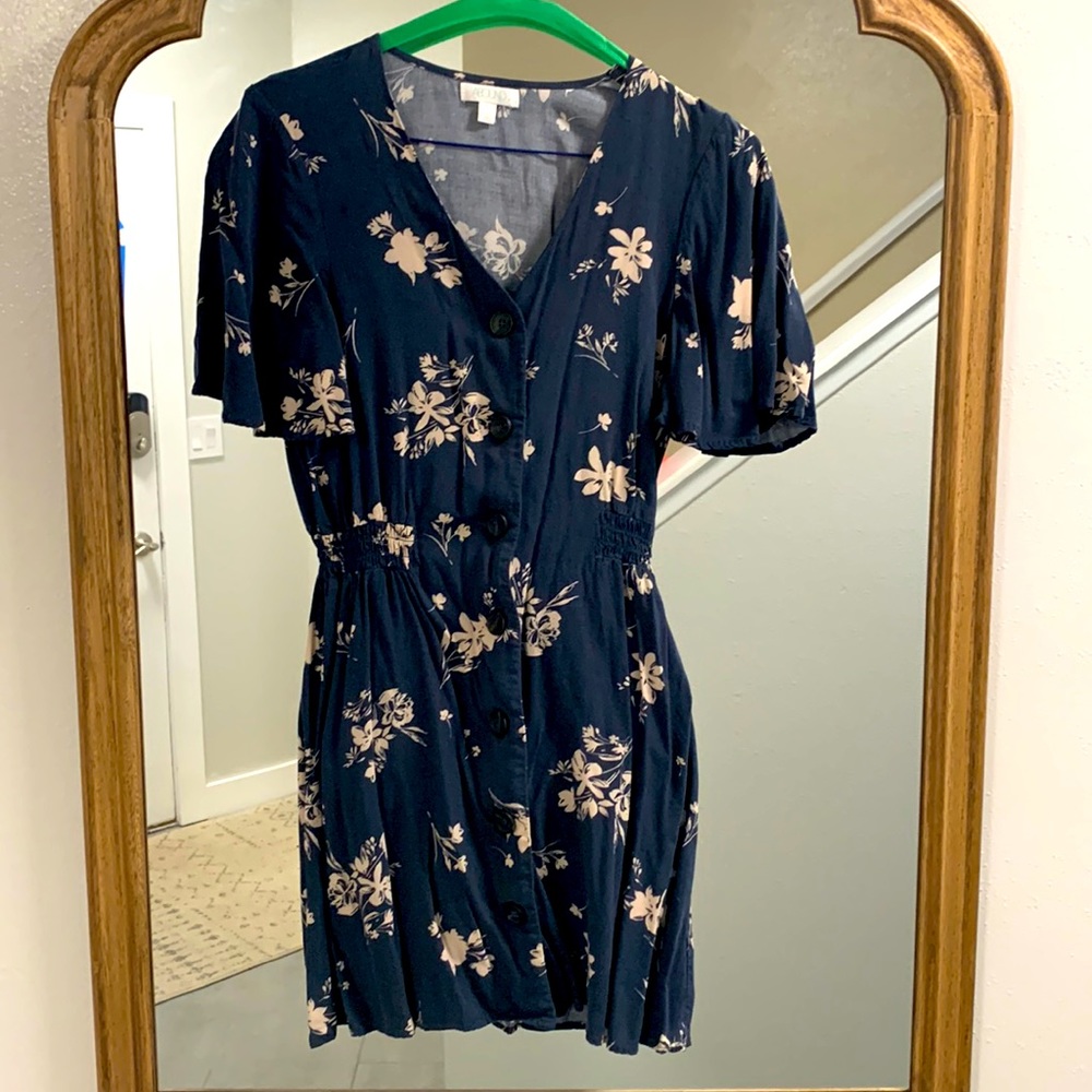 Fun flowy mini dress. Buttons all the way down.